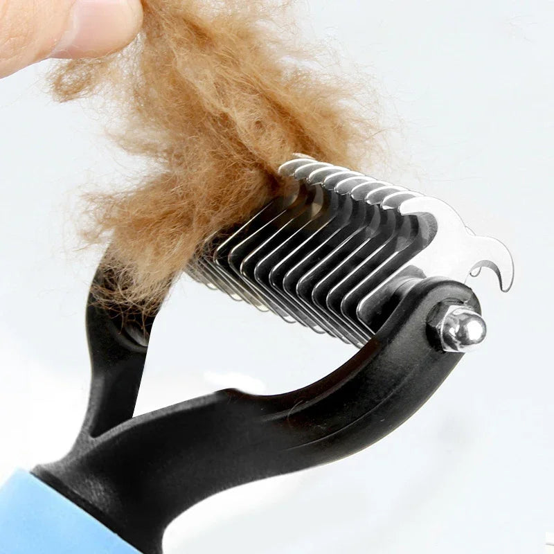 A hand is using a stainless steel pet hair removal comb brush to groom brown pet fur.