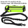 A bright yellow hands-free dog leash featuring a waist bag and black strap with reflective stitching.