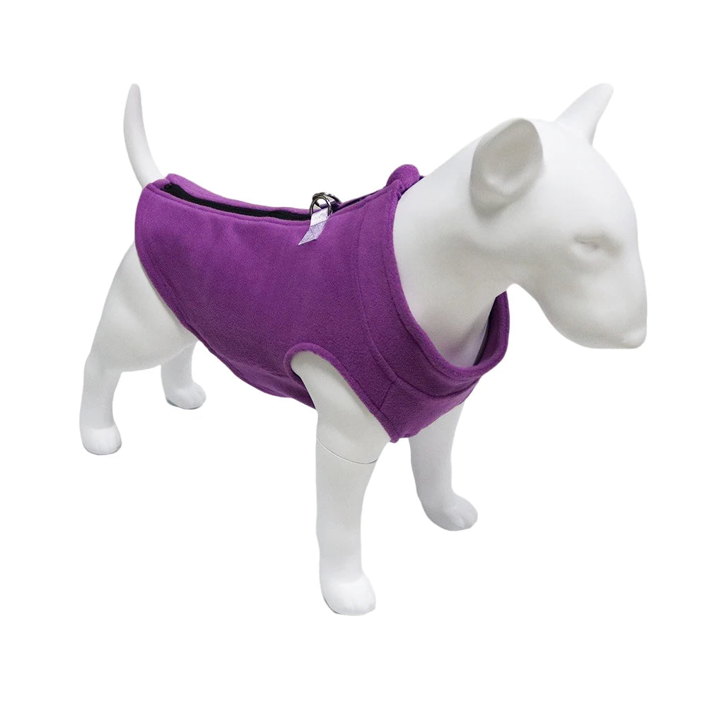 A white dog model wearing a purple soft fleece vest for small and medium dogs.