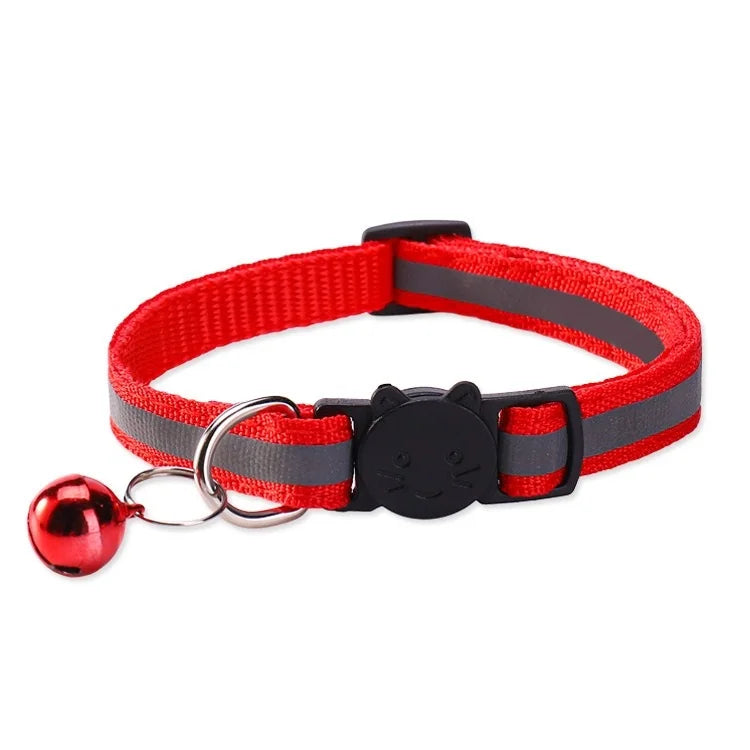Red and black safety breakaway cat collar with a bell and silver clasp.