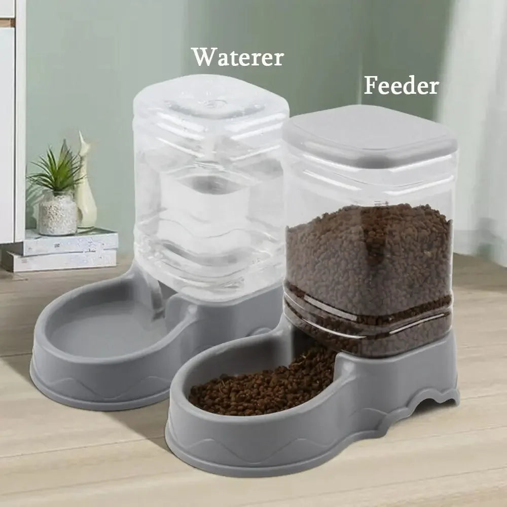 A clear pet food bowl and water dispenser set for dogs and cats, showing a feeder and a waterer.