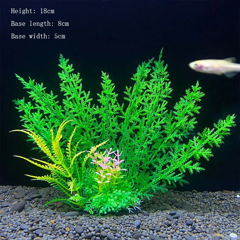 A vibrant green artificial aquatic plant with fine foliage is displayed on a gravel substrate.