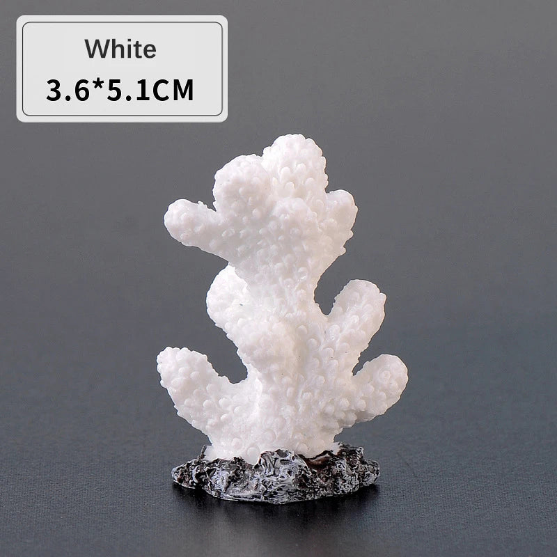 White resin coral decoration with a black base, measuring 3.6x5.1cm.