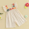 A cream-colored floral embroidery toddler romper for girls with pink and yellow accents.