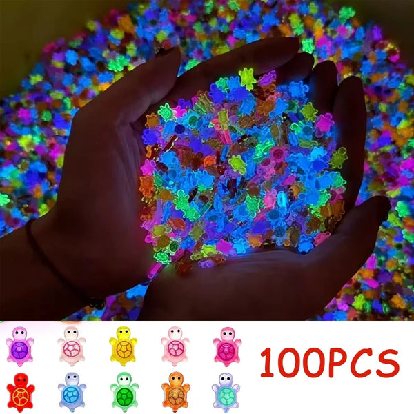 A hand holds a pile of glow-in-the-dark resin turtle figurines under bright light.