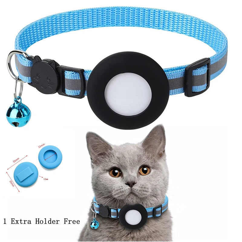 A blue and gray breakaway cat collar with a reflective strip and an airtag holder is shown next to a cat.