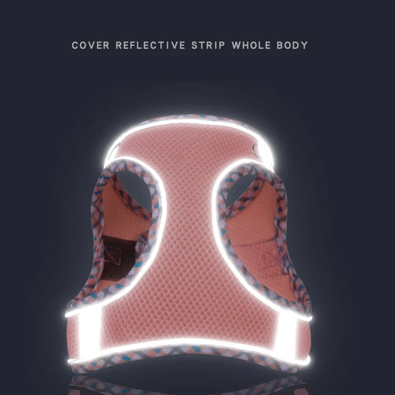 A pink reflective strip harness worn by a pet, designed for dog or cat.