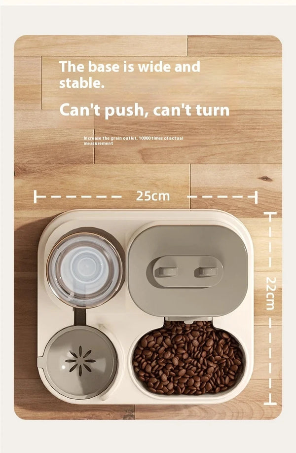 A white gravity-fed pet food and water station with a wide base, showing the feeding mechanism and capacity.