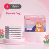 A box of 10 disposable female dog diapers is displayed on a pink stand with a pink background.