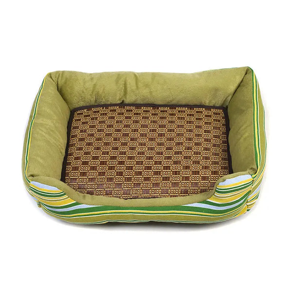 A rectangular pet bed mat with olive green fabric and a brown patterned insert.