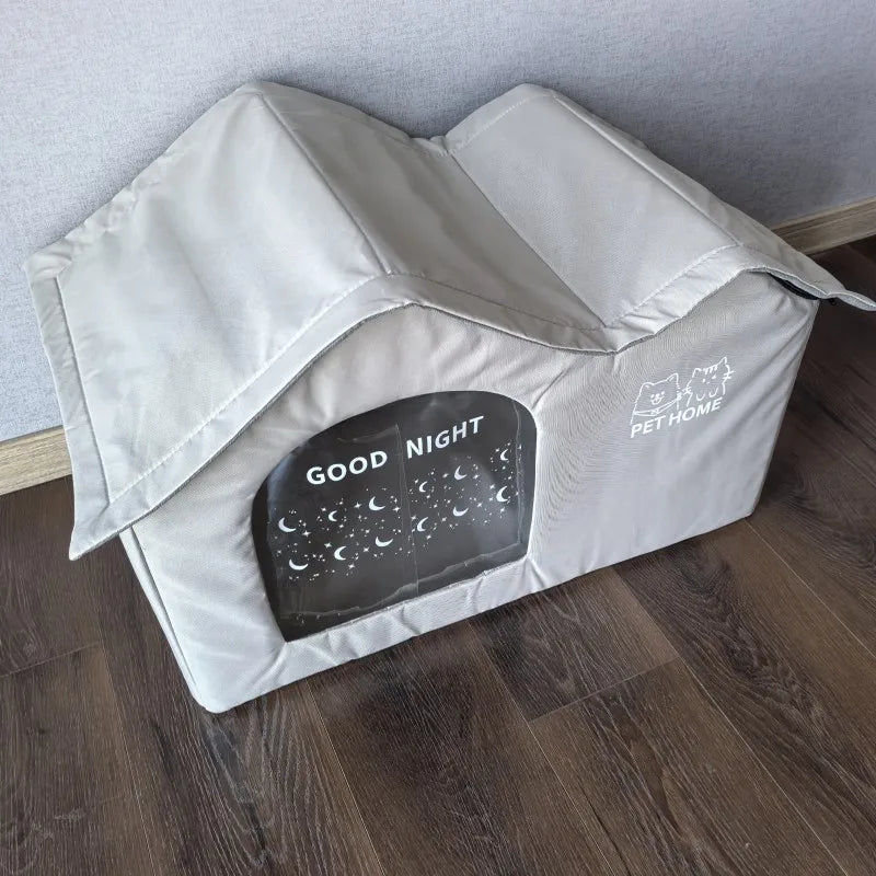 A light gray pet cooling house designed for cats, featuring a dark plaque with stars and the text GOOD NIGHT.