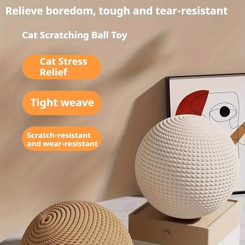 A white, textured cat scratching ball toy resting on a wooden box.