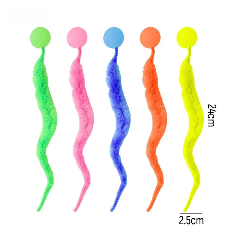 A set of five colorful, fuzzy caterpillar-shaped bouncing balls in green, pink, blue, orange, and yellow.