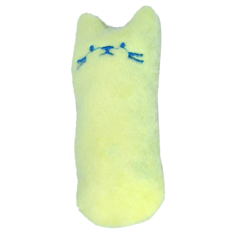 Ein kleiner, gelber Katzen-Plüschtier mit blauen Gesichtsmarken.