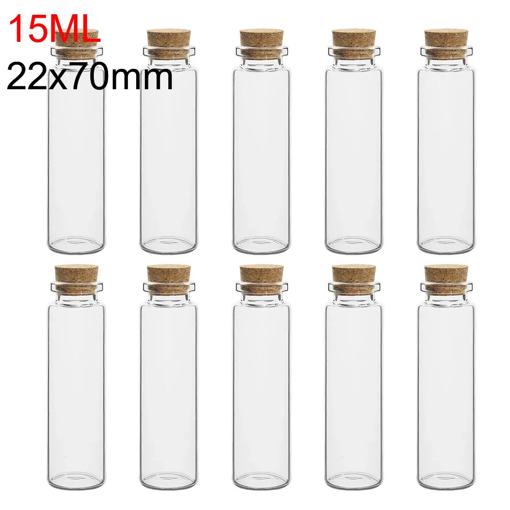 A set of ten mini glass bottles with cork stoppers, measuring 15ml and 22x70mm.