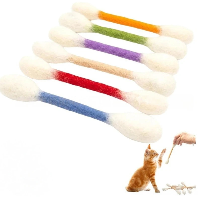 A pack of six felt chew sticks for cats in various colors including white, orange, green, purple, red, and blue.