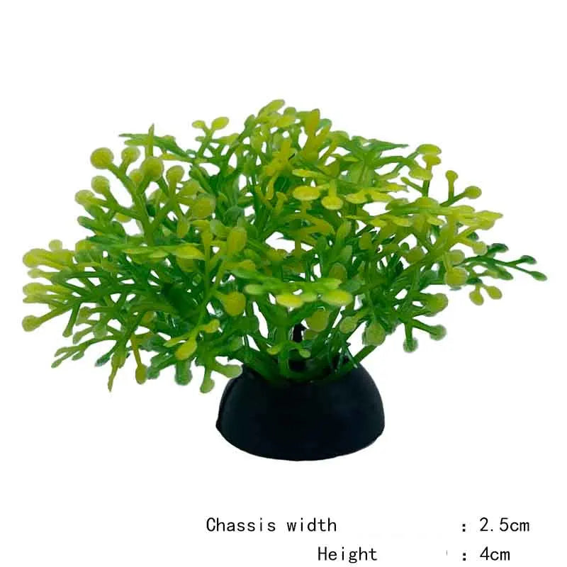 A vibrant green artificial aquarium plant with small, clustered leaves in a black pot.