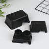 Black reptile hide box enclosure pieces shown on a white surface.