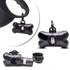 Black reusable pet poop bag dispenser with a leash clip and a roll of bags.