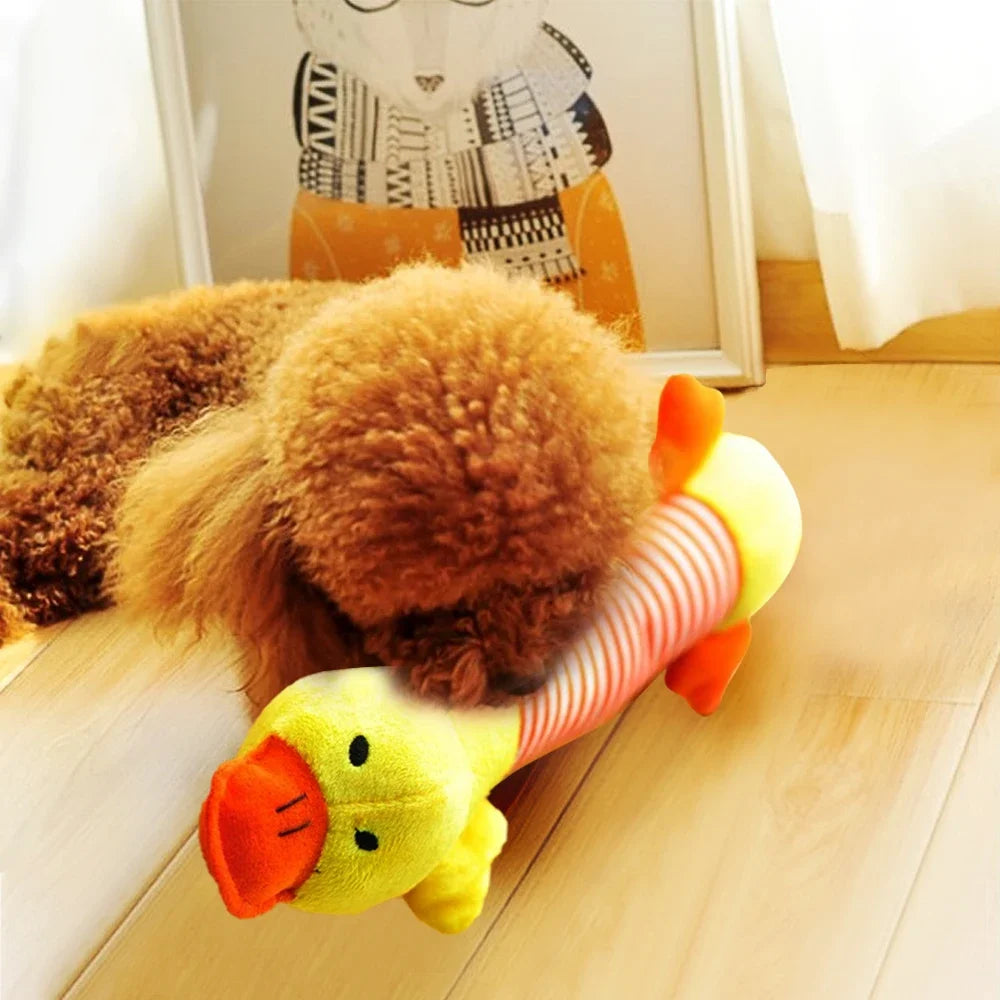 A plush fleece squeaky pet toy shaped like an elephant, duck, and pig for dogs and cats.