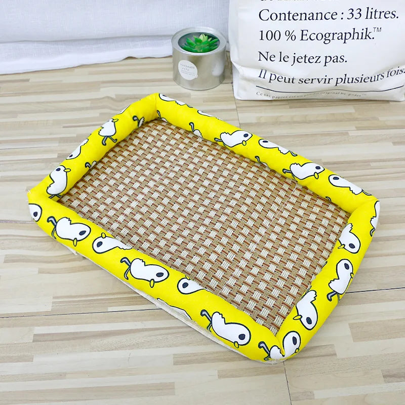 Yellow rattan pet bed with a breathable cotton mat and white decorative elements