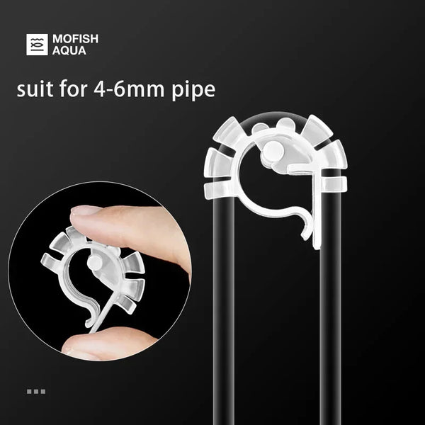 A close-up view of a clear U-shaped aquarium hose clip designed for 4-6mm pipe, shown attached to a black tube.