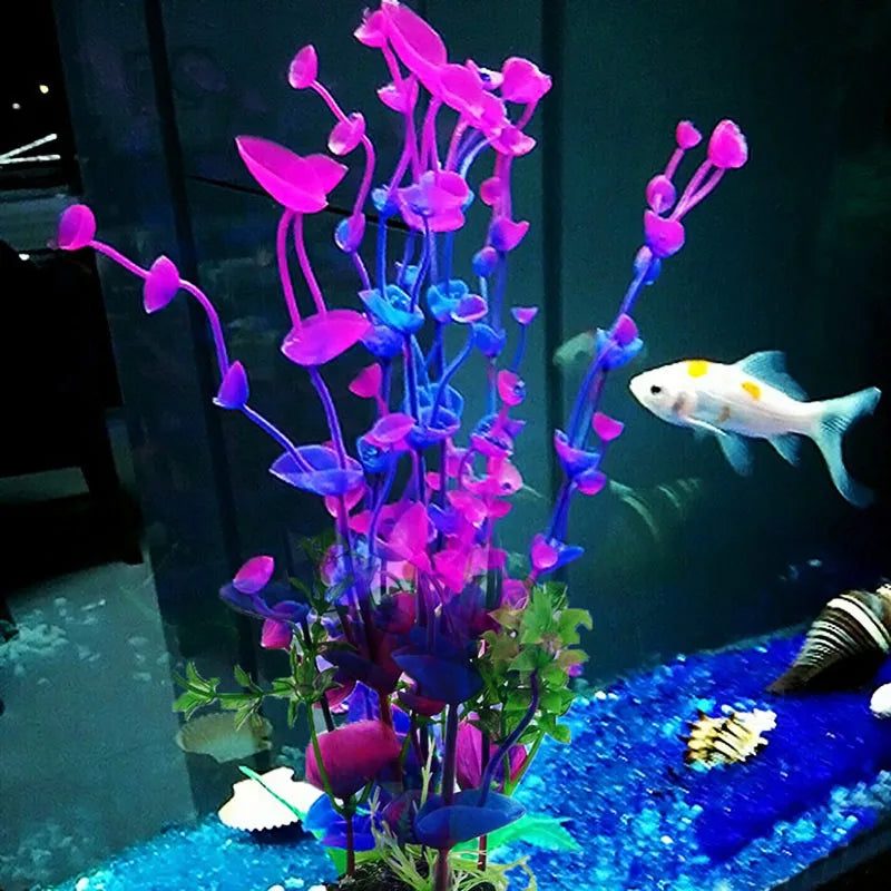 A vibrant artificial aquarium plant featuring purple and blue flowers in a glass tank.