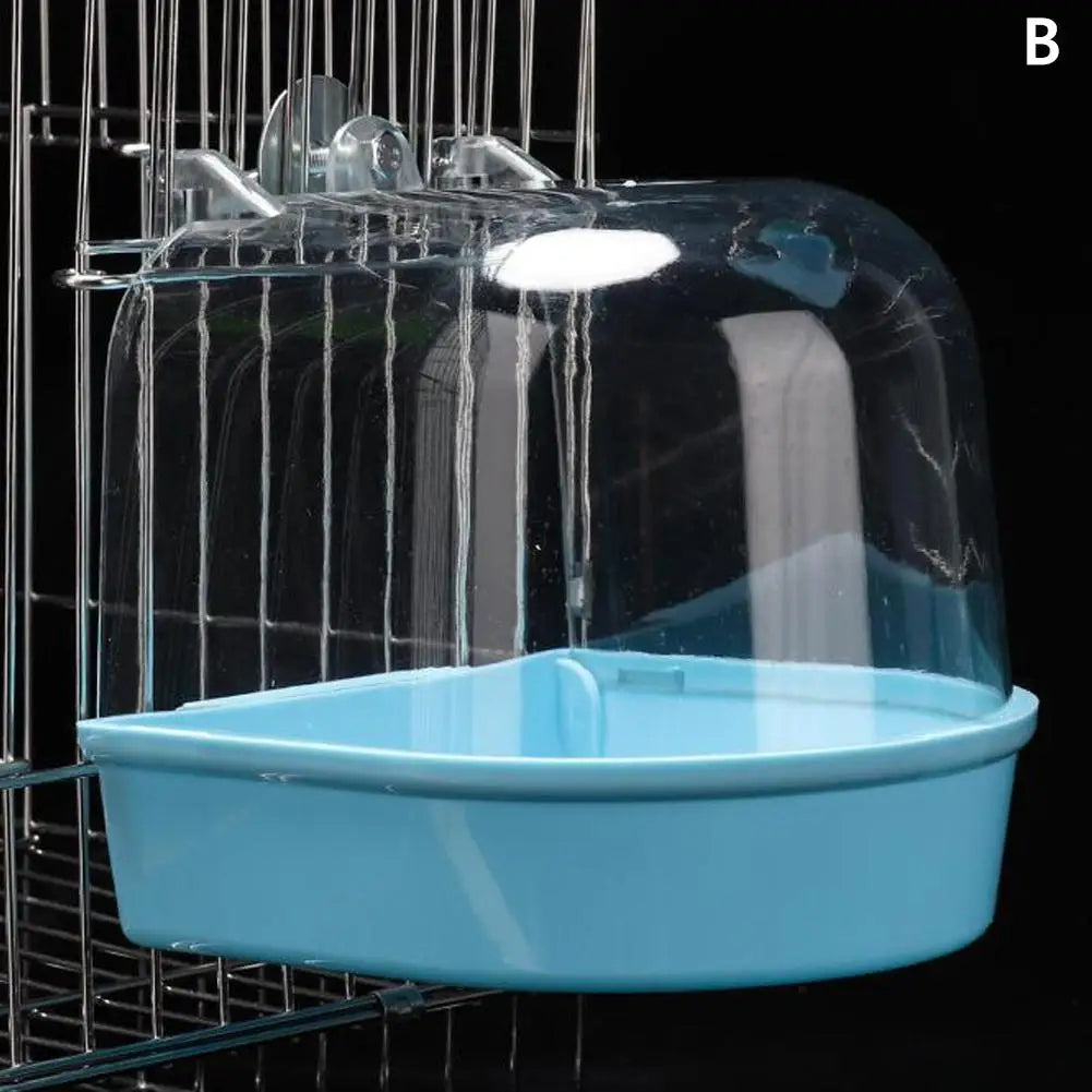 A clear hanging bird bath with a light blue base is suspended in a wire cage.