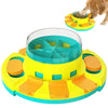 A yellow and blue interactive dog slow feeder puzzle toy with a feeding bowl and orange puzzle pieces.