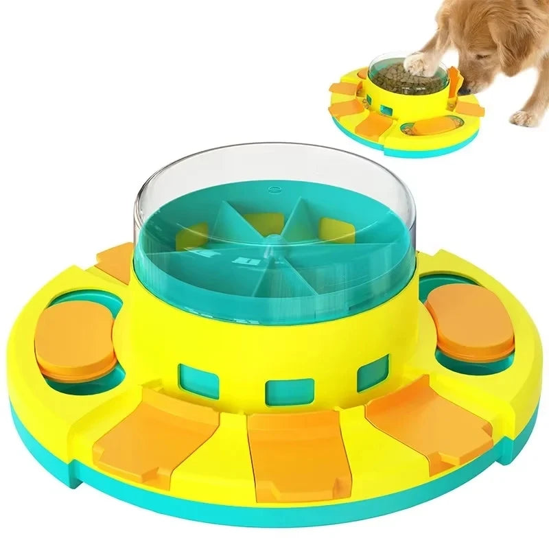 A yellow and blue interactive dog slow feeder puzzle toy with a feeding bowl and orange puzzle pieces.