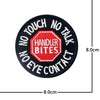 Black embroidered patch with red text and a hexagonal logo on the front, featuring phrases like NO TOUCH NO TALK and HANDLER 