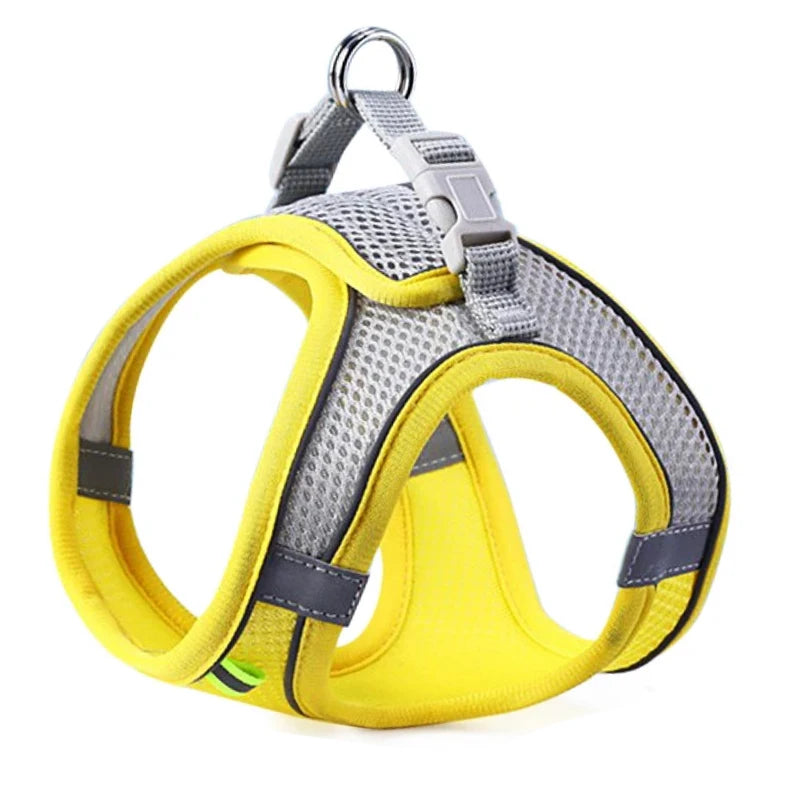 A yellow and gray reflective adjustable pet harness is shown against a white background.