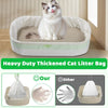 A fluffy cat is sitting inside a light-colored litter box liner, demonstrating the heavy duty cat litter bag product.