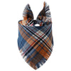 A plaid bandana featuring blue, brown, and orange tones with fringed edges.