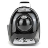 A black transparent pet carrier backpack with a handle and a dome-shaped design.