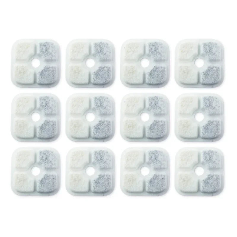 A pack of twelve square, white and gray replacement filters for a cat water fountain.