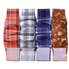 A set of four reusable washable dog diaper wraps or sanitary belly bands in plaid and solid colors for male dogs