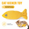 A yellow cat kicker toy shaped like a fish, filled with premium catnip, being played with by a kitten.