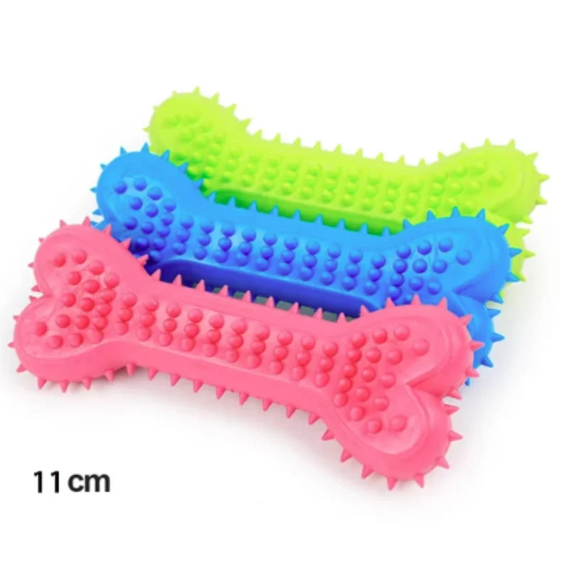 A set of three colorful durable TPR dog chew toys shaped like bones, including a cleaning bone, pacifier, and thorn ring.