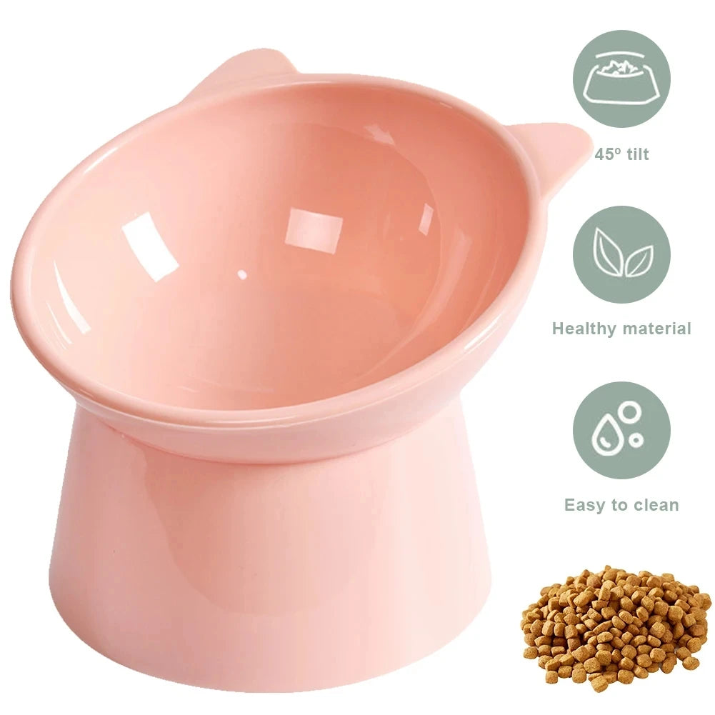 A pink pet feeding bowl with a tilt feature, highlighting healthy material and ease of cleaning.
