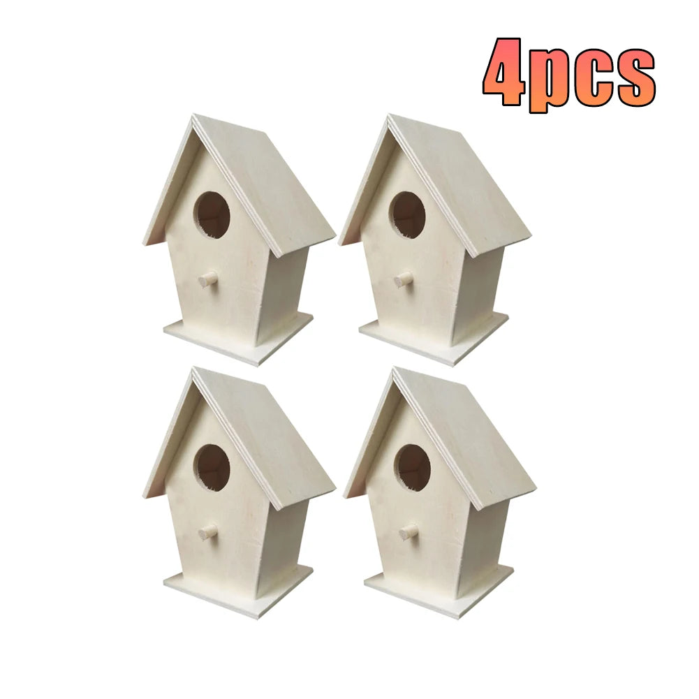 Four white wooden wall-mounted bird houses shown in a flat lay arrangement.