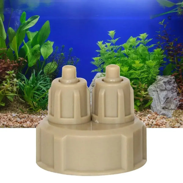 A beige plastic bottle cap designed as an aquarium CO2 diffuser for plant growth.