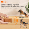 A hand holds a mini ultrasonic dog repeller device, demonstrating its use to scare away a dog.