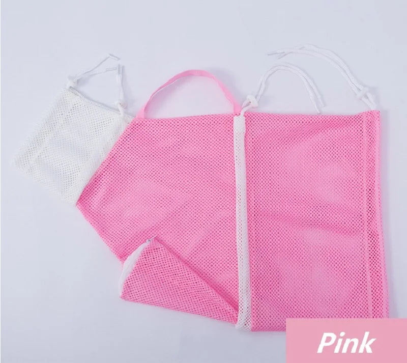 Pink mesh grooming bag for pets with white straps