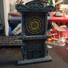 Tour d'horloge imprimée en 3D gris foncé avec cadran orné et détails architecturaux.