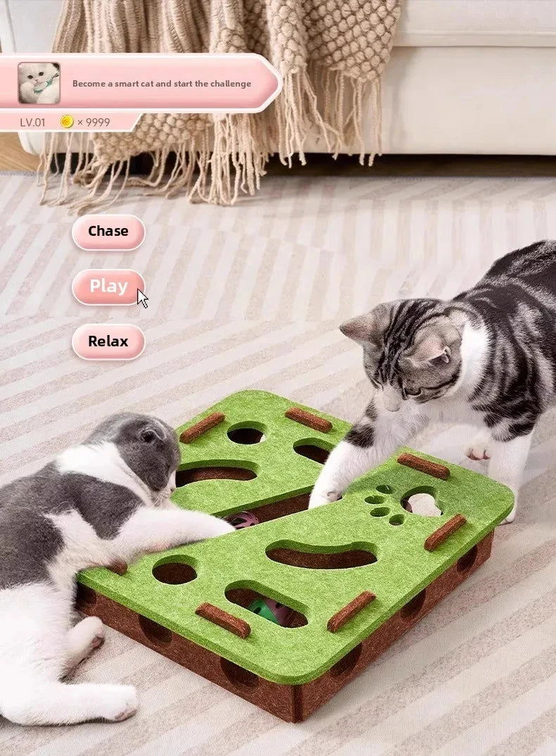 A tabby cat interacts with a green felt puzzle toy designed for cats.