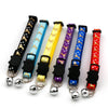 A set of adjustable pet collars featuring various colors and patterns like black, blue, yellow, purple, and red.