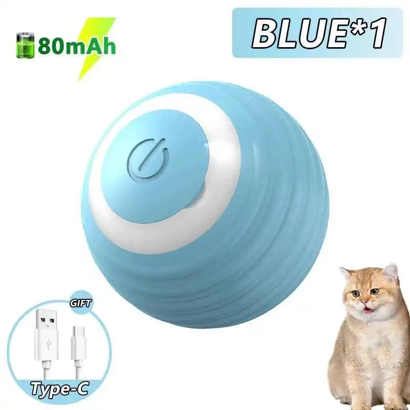 Blauer elektronischer Spielball mit weißer Leuchte neben einer Katze.