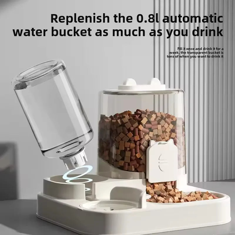 A clear water dispenser bottle is shown next to a white gravity pet feeder and water dispenser set.