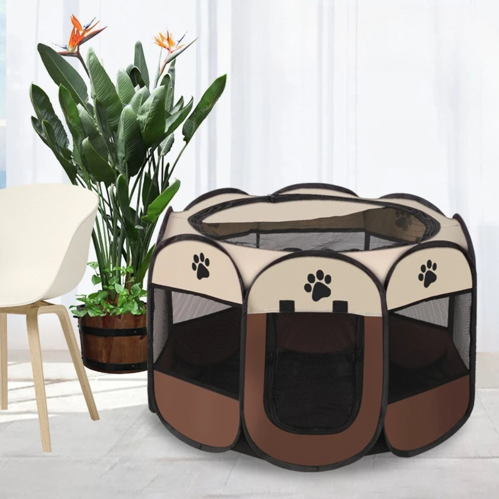 A portable foldable pet tent and playpen with a mesh enclosure and brown fabric accents.